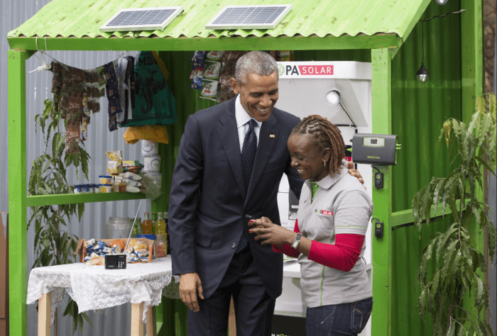 President Obama is taken through the working mechanism of the M-Kopa Solar Home system after delivering remarks at the Global Entrepreneurship Summit in Nairobi in 2015