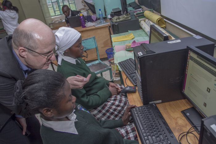 Microsoft 4afrika Academy Dean Lutz Ziob with students of Sweetwaters Secondary School