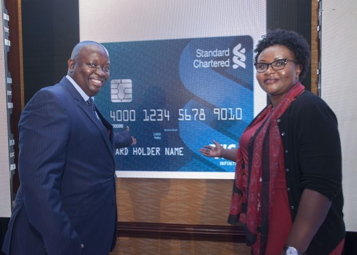 Visa Kenya Country Manager Victor Ndlovu (left) and Standard Chartered B...