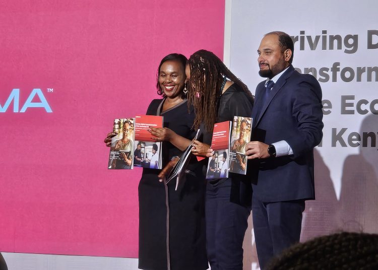 image of Dr. Margaret Nyambura Ndung’u, ICT CS and GSMA leaders holding the GSMA report at movenpick hotel