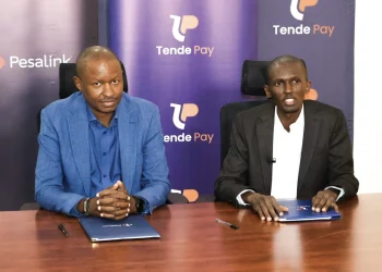 Gituku Kirika, CEO of IPSL and Abel Masai, CEO of TendePay during the signing ceremony.