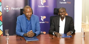 Gituku Kirika, CEO of IPSL and Abel Masai, CEO of TendePay during the signing ceremony.