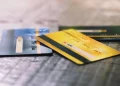Several credit cards on wooden table