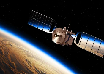 Reflection of earth in solar panels of a space satellite