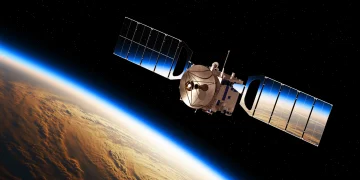 Reflection of earth in solar panels of a space satellite