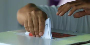 A voter casting a ballot on election day